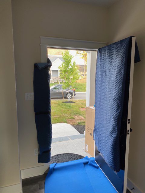 A door open to the outside of a house.